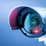 Police Chief ARRESTED—Shocking Surveillance Scandal! Close-up of a CCTV security camera.