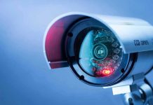 Police Chief ARRESTED—Shocking Surveillance Scandal! Close-up of a CCTV security camera.
