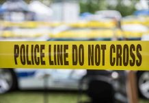 Watts’ Heinous Crimes Exposed: Unbelievable Twist Yellow police line tape with Do Not Cross.