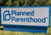 Trump’s Bill DESTROYS Planned Parenthood Empire Planned Parenthood sign on a grassy lawn.