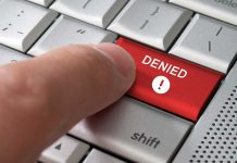 Judge Nukes Lenient Deal for Funeral Home Horror A finger pressing a red DENIED button on a computer keyboard