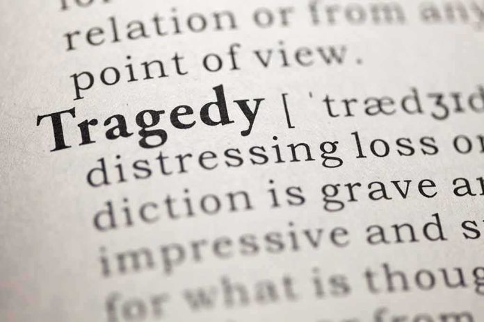 shutterstock_154276778 (2).jpg Close-up of the word 'Tragedy' in a dictionary with its definition