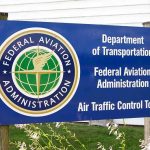 Trump’s $10,000 Bonus Bombshell Sparks Chaos Sign for the Federal Aviation Administration at an air traffic control tower
