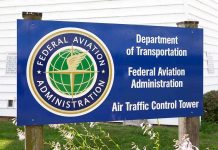 Trump’s $10,000 Bonus Bombshell Sparks Chaos Sign for the Federal Aviation Administration at an air traffic control tower