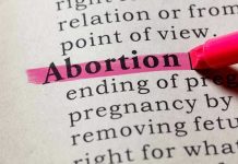 Florida Abortion Refusal Ends In Death Row Shocker Abortion highlighted in a dictionary with a pink marker.