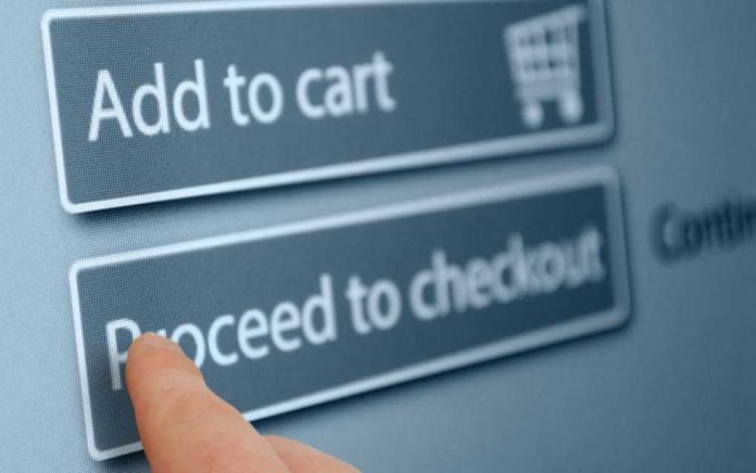 138594755 Finger tapping proceed to checkout button online