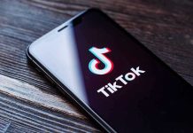 Illegal Immigrant Taunts U.S. Enforcement on TikTok Phone screen showing TikTok logo and app.