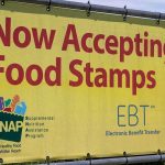 Immigrant’s Taunt Video STUNS America Yellow sign now accepting food stamps EBT SNAP