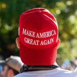 MAGA-Style Ultraconservative Party Just WON in This Country! Person wearing a red Make America Great Again hat.