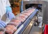 Restaurant Owners FURIOUS Over Plastic Ban In This State Packaged chicken breasts on a factory conveyor belt.