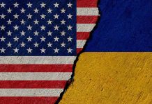 Zelensky Makes Move Toward Trump Torn United States and Ukraine flags.