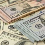 See How Democrats’ Wild Tariff Attack Backfired Stacks of various U.S. dollar bills.