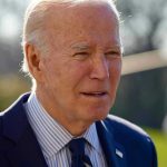 Russia Peace Talks EXPOSE Biden Disaster Elderly man in suit outside in daylight.