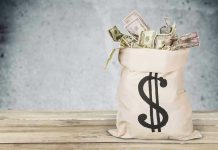 A 230-Year Tradition CUT from U.S. Mint Bag of money with dollar sign.