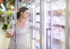 Florida Freezer Hoax EXPOSED—Truth Finally Revealed A woman shopping in the frozen food aisle of a supermarket