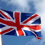 UK Now DEMANDING Discloser Of Private Associations British flag waving against a blue sky