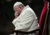 Viral Pope Hoax EXPOSED — The Shocking Truth Pope sitting with his head bowed and hand covering his face