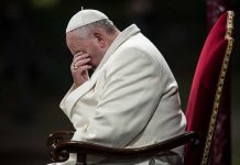 Viral Pope Hoax EXPOSED — The Shocking Truth Pope sitting with his head bowed and hand covering his face