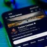 Tucker Carlson’s ‘WARNING’ On Venezuela Smartphone displaying a YouTube channel profile page.