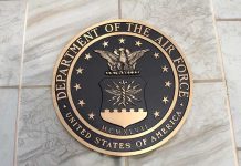 17 Guinness Records—Can You Believe It? Bronze seal of the Department of the Air Force on a tiled surface