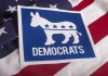 Democrats’ War Past Suddenly Turns Toxic Democrats logo on American flag background