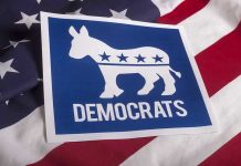 Democrats’ War Past Suddenly Turns Toxic Democrats logo on American flag background