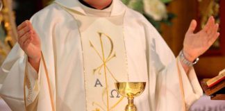 Priest Turns Cemetery Church Into Nightclub A priest holding a golden chalice during a religious ceremony