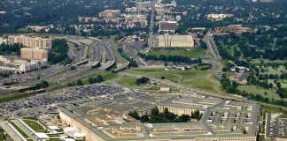 Pentagon’s Secret Weapon Hunts Iranian Boats Aerial view of the Pentagon surrounded by highways and urban areas
