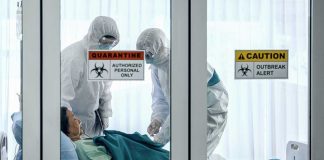 PANIC Aboard Cruise—WHO Chief Races to Crisis Healthcare workers in protective gear in quarantine room.