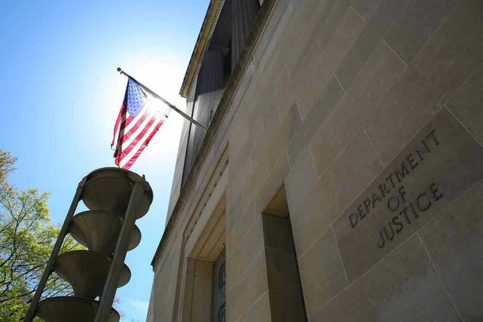 2152403209 American flag at Department of Justice building exterior.