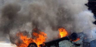CHILD HERO Filmed Arizona Fire Rescue An overturned car engulfed in flames and smoke on a city street