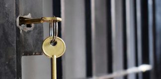 Judge JAILS Parents Over Homeschool Lessons! Key in lock of prison cell door.