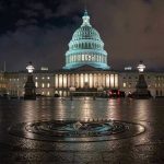 Trump Threatens D.C. Takeover NEXT WEEK – What’s TRIGGERING This? U.S. Capitol building illuminated at night with wet pavement.