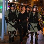 Mass Arrest BLITZ — 6,500 VANISH Overnight Police arresting a person during a nighttime protest