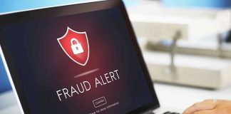 CATFISH Romance Ends In Battlefield BETRAYAL Laptop displaying fraud alert warning on screen