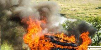 Mystery HIGHWAY FIREBALL Torches 30 Acres FAST Burning car with flames and smoke on roadside