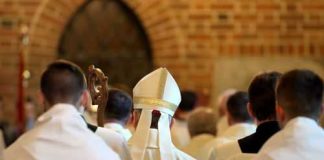 CHILLING Hit Job? Bishop Killed in OWN HOME Clerics in white robes facing altar in church