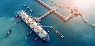 PIRATE TALK From Trump EXPOSES Opposing ANGLES Aerial view of a liquefied natural gas tanker at a port