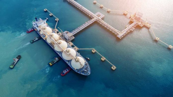 shutterstock_2606176195 Aerial view of a liquefied natural gas tanker at a port