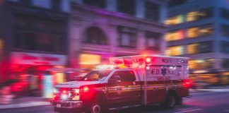 Holiday Cookout Turns Into WAR ZONE Ambulance speeding with flashing lights in city street