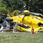 Thrill Flights Under Fire After Shocking Smash yellow helicopter crash scene on grassy field