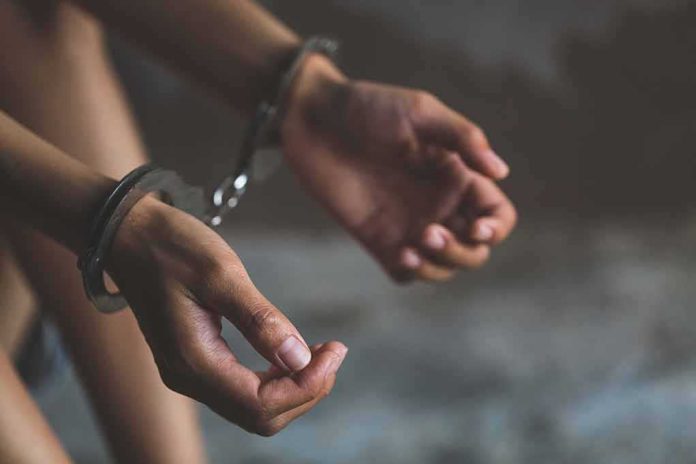 hands in handcuffs