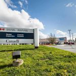 Border Whiplash — LOOK WHO’s Fleeing US For CANADA! Canada border inspection sign at roadside checkpoint