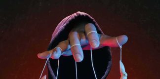 China MONEY TRAIL Rattles BIDEN’S World Hooded figure controlling a wooden puppet with strings