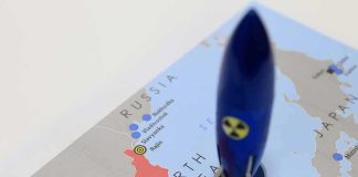 33-Minute NIGHTMARE — No WAY to STOP IT! Blue toy rocket on a map of North Korea and surrounding countries