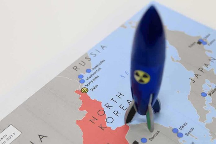 shutterstock_545125204-1 Blue toy rocket on a map of North Korea and surrounding countries