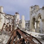 TRAGIC — Arson TORCHES 140-Year CATHOLIC Icon Interior view of a destroyed building with collapsed arches and debris
