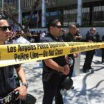 HORRIFYING Child Ring JUST EXPOSED Los Angeles police officers standing behind a police line