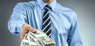 Investor DARES Congressman — Pay 5% First! Person in business attire offering bundles of US dollar bills