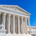 Trump Scores Win — SCOTUS RULES Supreme Court building with tall marble columns under a clear blue sky
